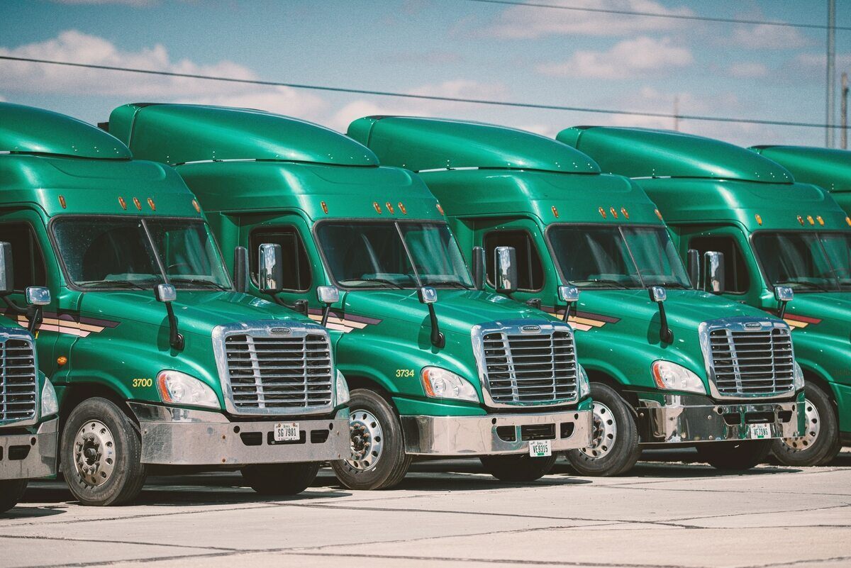 Green trucks lined up